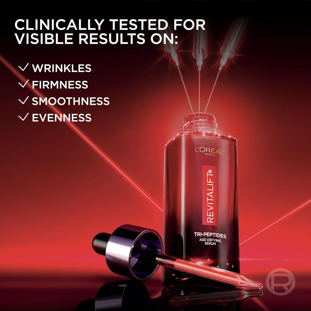 L'Oreal Paris Revitalift Triple Power Age-Defying Face Serum, Anti Aging Serum with 3 in 1 Benefits, Reduces Wrinkles, Firms and Brightens Skin, Includes Sample Clarke's Vibe Store